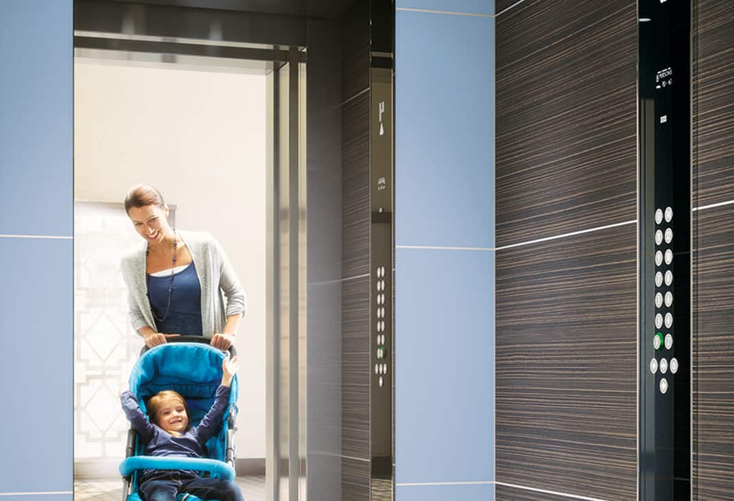 img_woman_with_stroller_enters_elevator_1070x730